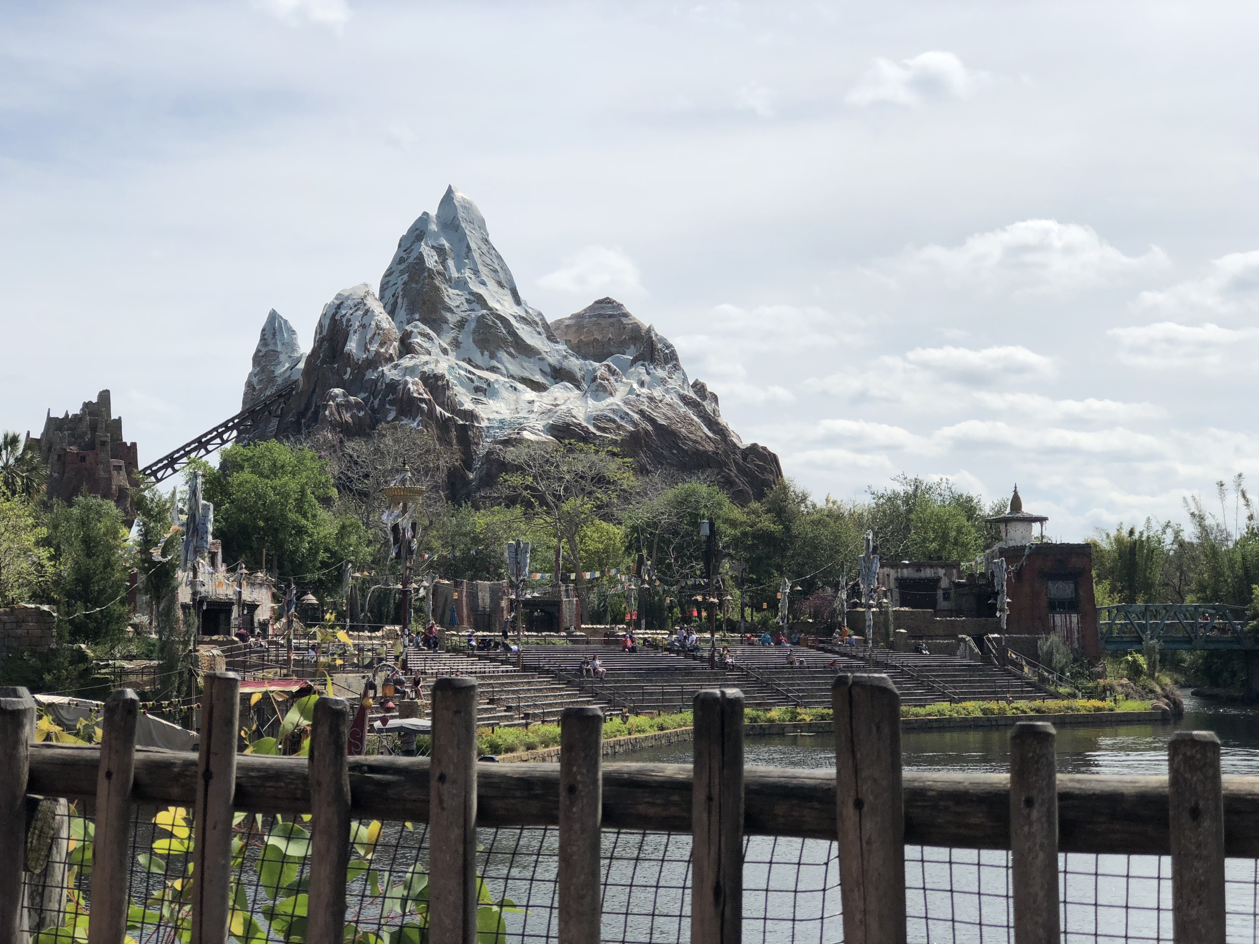 Picture of Fence, Lake, then Mount Everest In Background.