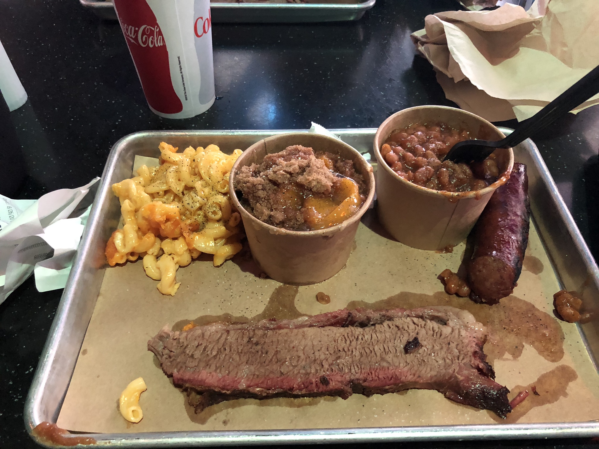 brisket, sausage beans mac n cheese peach cobbler